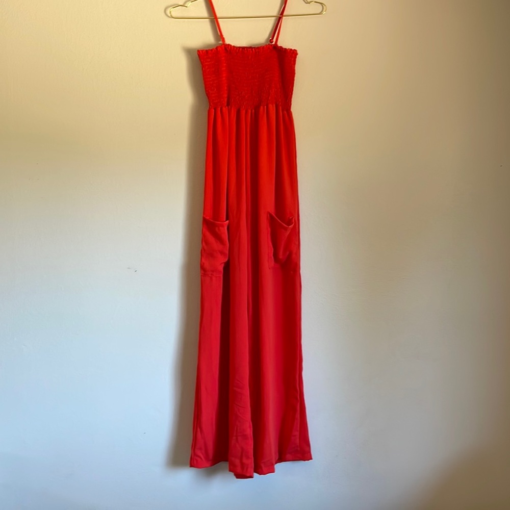 Red jump suit
